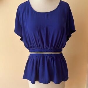 Bebe Louise open back blue blouse. New.